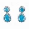 Rhodium Plated Silver Earrings with Blue Drop Shaped Stones